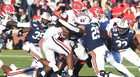Sep 30, 2023 · 44.5. -110o / -110u. +450. Odds via BetMGM. Get up-to-the-minute NCAAF odds here. The "Deep South's Oldest Rivalry" between Georgia and Auburn is set for the 128th edition dating back to 1892. In a series that's nearly as old as the typewriter, the Bulldogs have won six straight and lead the series, 63-56-8. Georgia head coach Kirby Smart will ... 